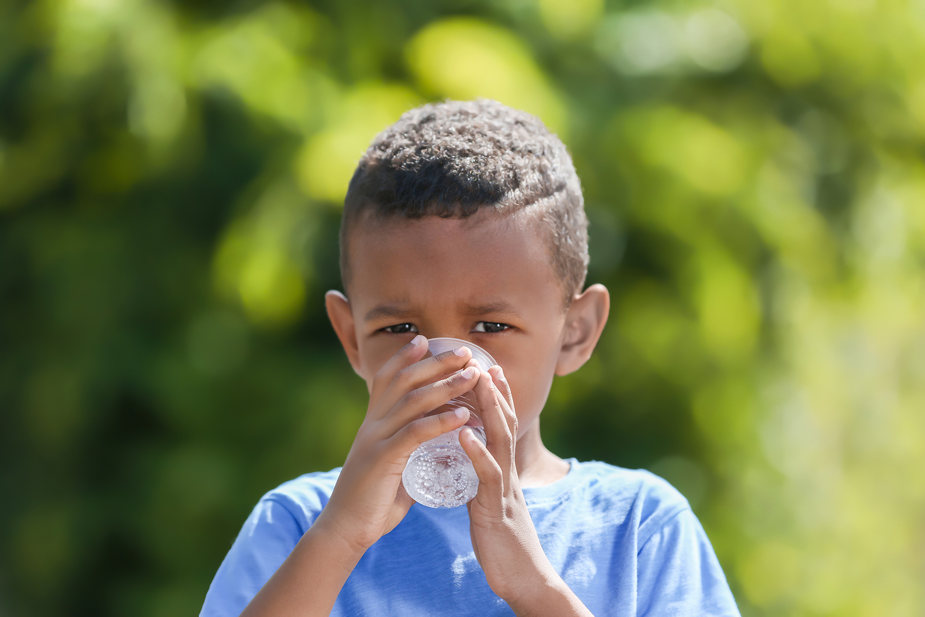 kid drinking water