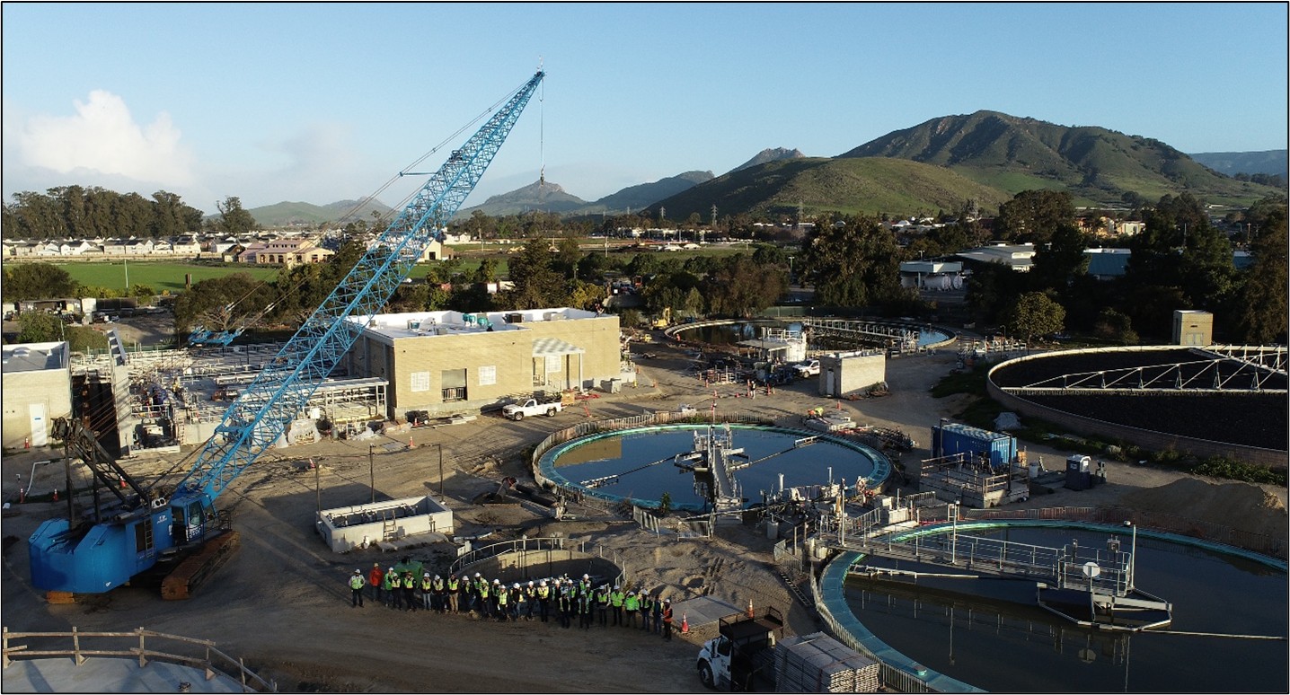 With the Cerro San Luis Obispo Mountain in background, the existing 1945 sewer treatment plant is on the right, and on the left is the construction of the new SLO facility with new membrane bioreactor.