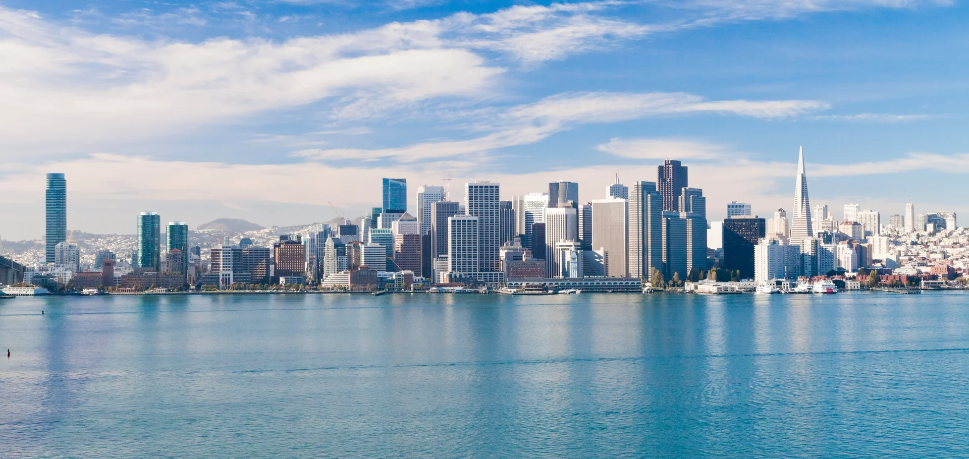 San Francisco Bay skyline panorama with teal waters reflecting the city