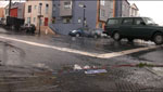 image of stormwater running across a street